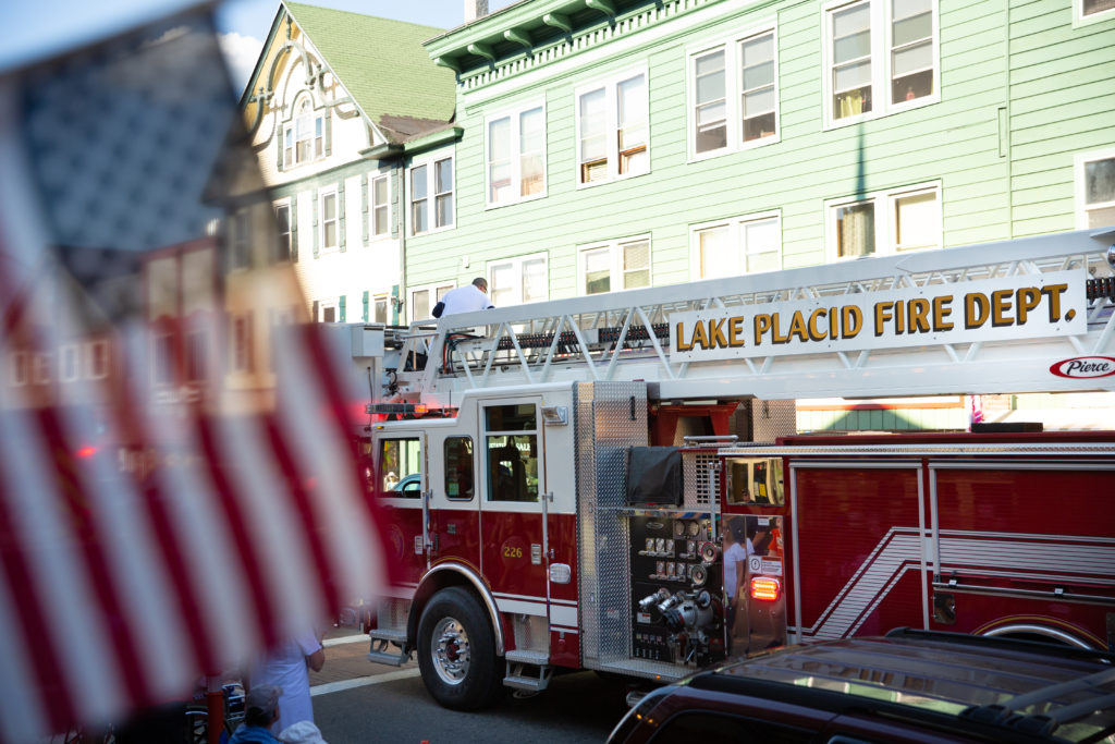 Firetruck passes through Main Street during the Lake Placid 4th of July Parade.