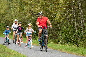 Family bikes the Junction Pass Trail in Tupper Lake
